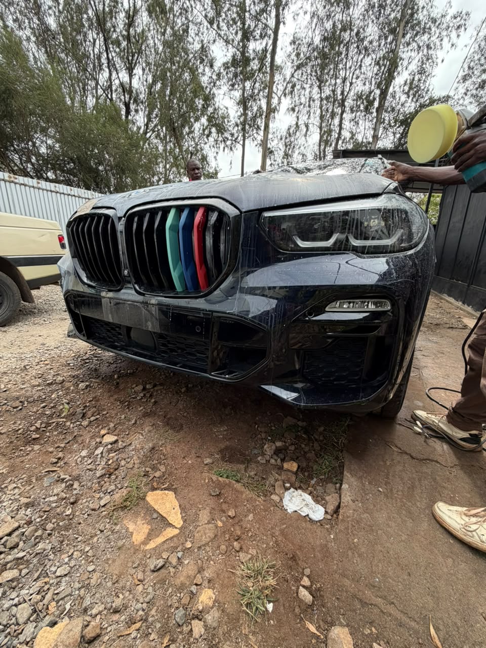 Full vinyl wrap installation in progress at DOP studio